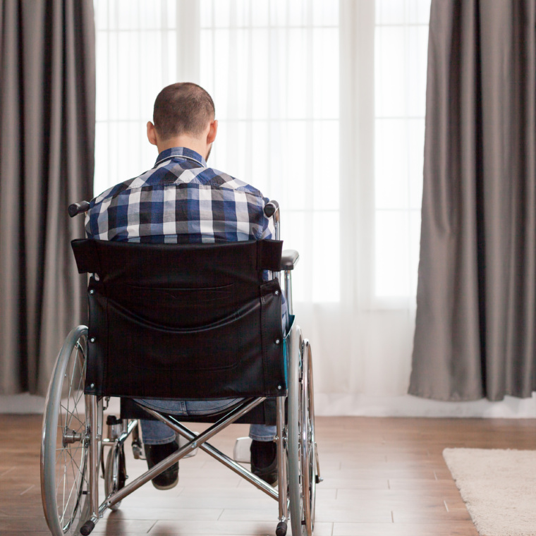 Paralyzed man in wheelchair